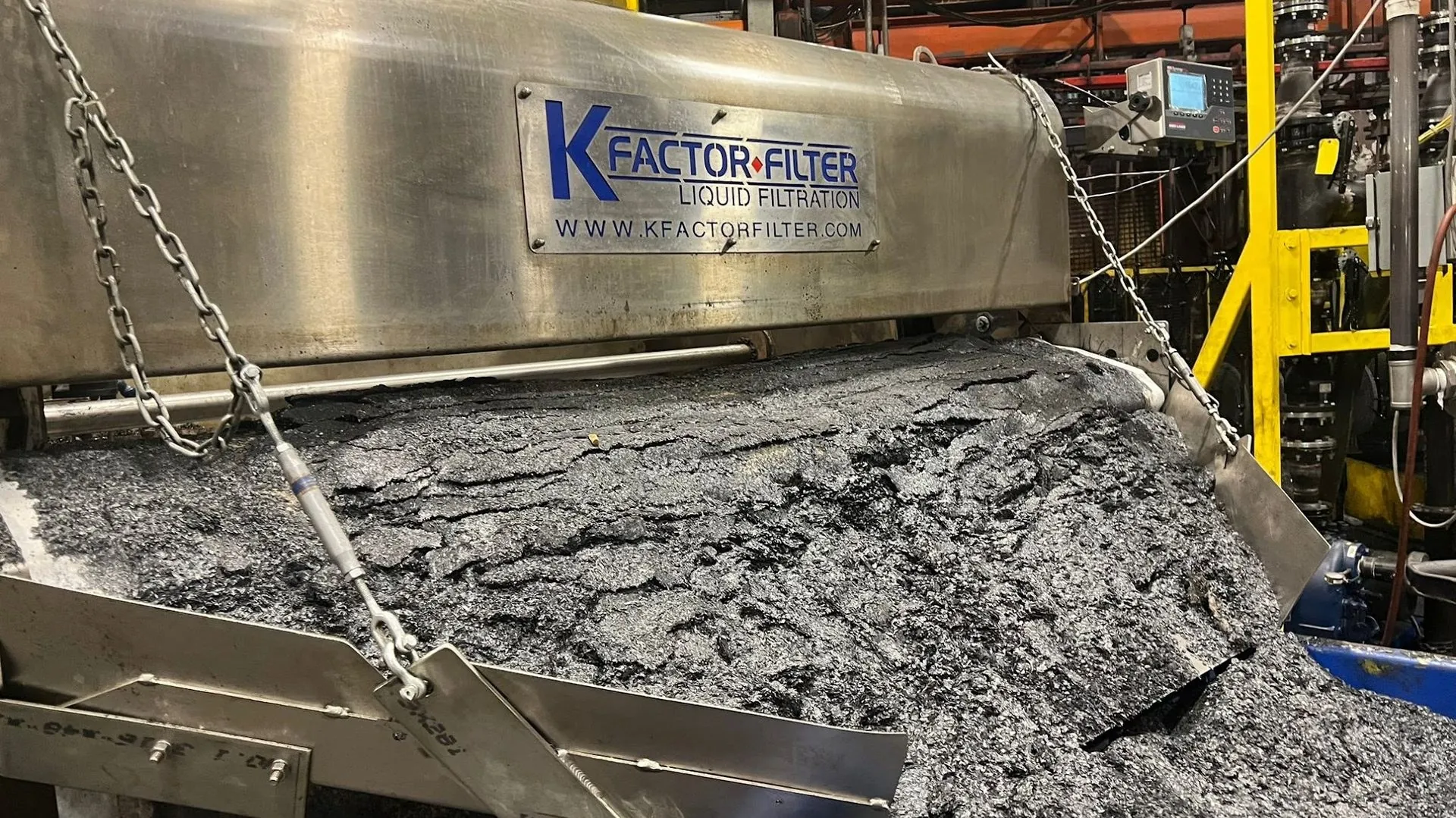 Thick cake of sludge on loaded filter media